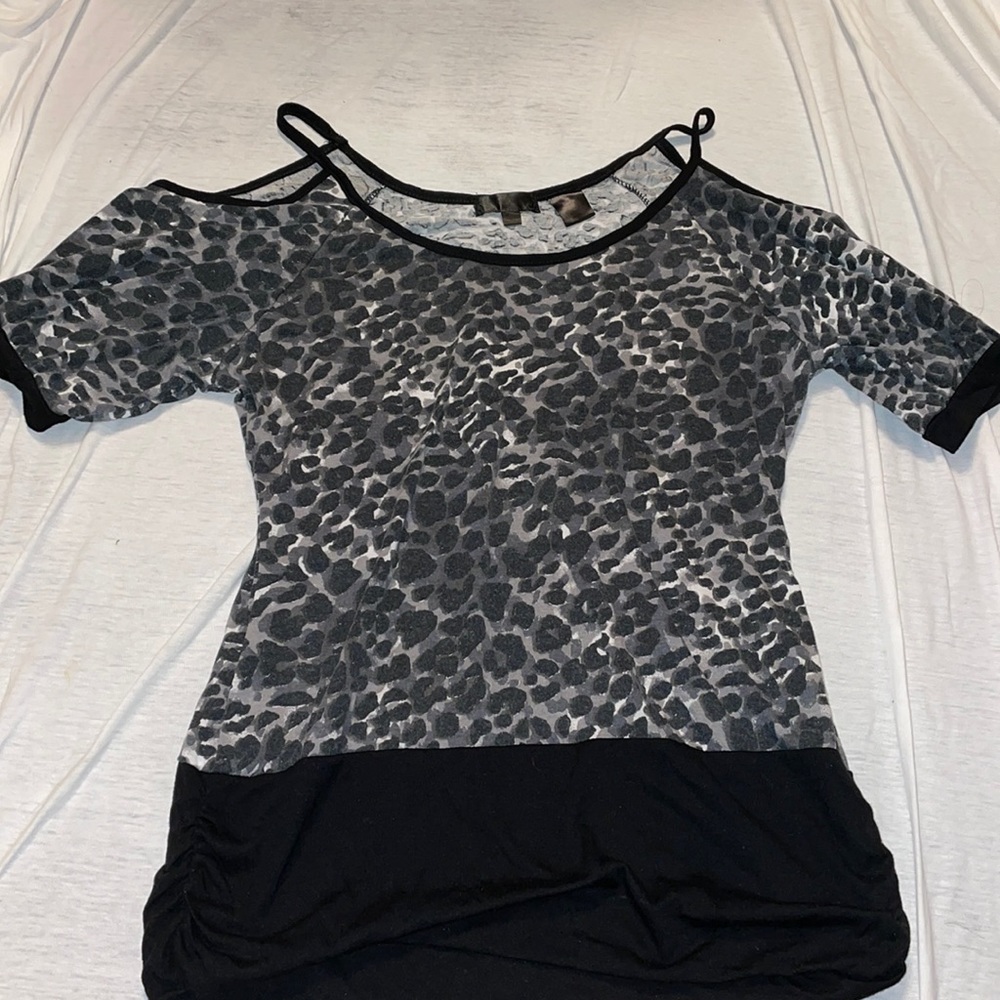 Cheetah print short sleeve shirt. Open on the shoulders, size medium